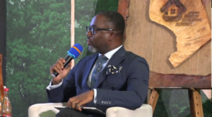 Jesse Agyapong moderating the panel